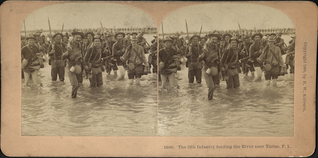 The 12th Infantry fording the River near Tarlac, P. I.